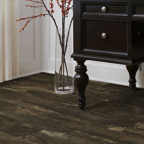 Dark brown laminate flooring from Prestige Flooring Center in Cathedral City, CA