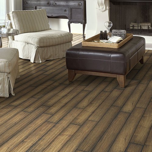 White armchairs on laminate floor from Prestige Flooring Center in Cathedral City, CA
