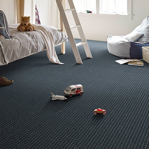 Kids room with grey carpet and toys on the floor from Prestige Flooring Center in Cathedral City, CA