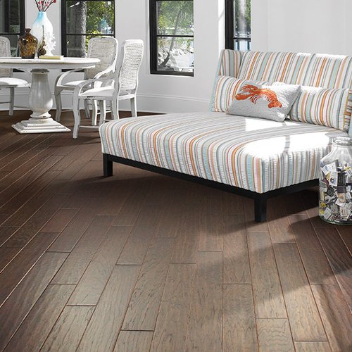 White sofa on hardwood flooring from Prestige Flooring Center in Cathedral City, CA