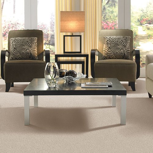 Living room with white sofas and coffee table in the middle from Prestige Flooring Center in Cathedral City, CA